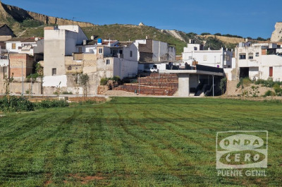 La antigua parcela industrial de los Llanos del Cristo de Puente Genil se recupera como parque fluvial